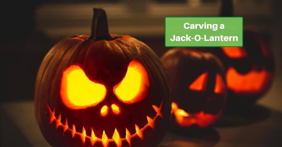 three scary jack-o-lanterns are lit by candles at night. Text Reads, Carving a jack-o-lantern