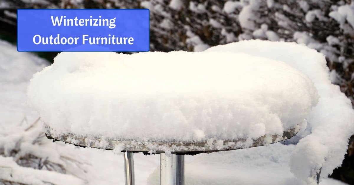 a snow covered patio table shows some rust on its edge. text reads, winterizing outdoor furniture